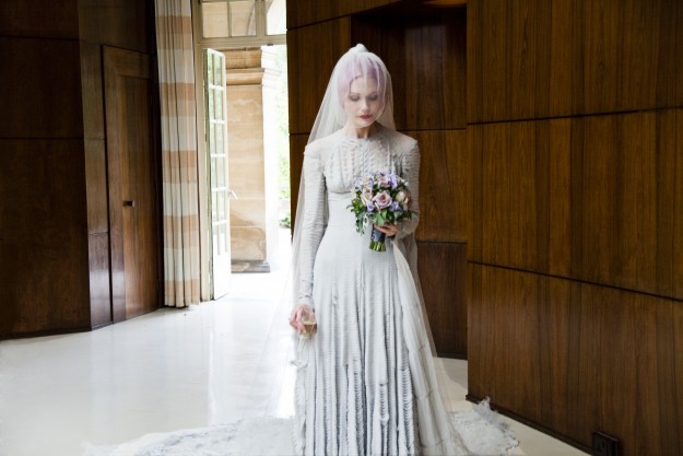 Pale grey slashed chiffon wedding dress designed by Gareth Pugh and veil by Stephen Jones, 2011 Worn by Katie Shillingford for her marriage to Alex Dromgoole  Artist: Courtesy of Katie Shillingford.   Date: 2011Photo © Amy Gwatkin